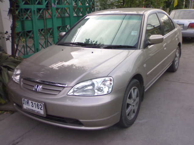 รถสีทอง ปี 2001  ควรใส่แม๊กสีอะไร ลายอะไรดีครับ
