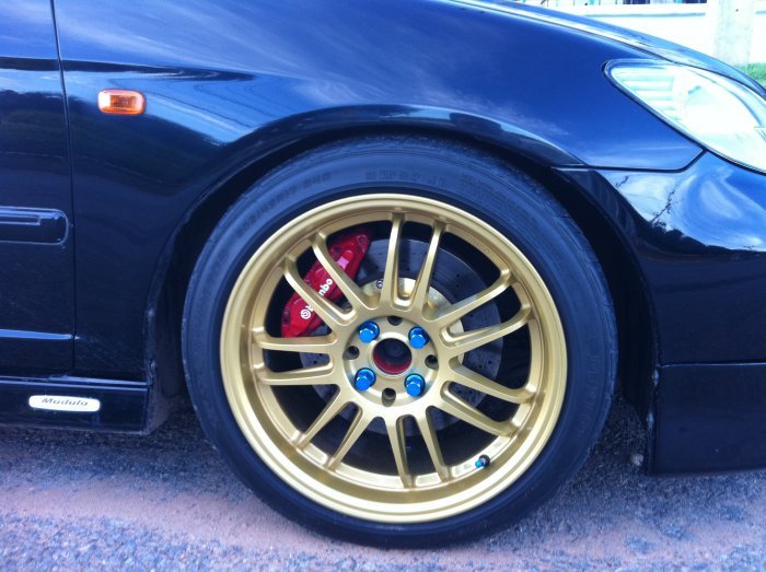 re30 gold + nut blue rays เบรค 4 port จาร 2 ชิ้น 320mm.