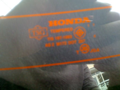 กระจกบานหลังยี่ห้อ TSG มีโลโก้ Honda , มอก. และ JIS ครับ