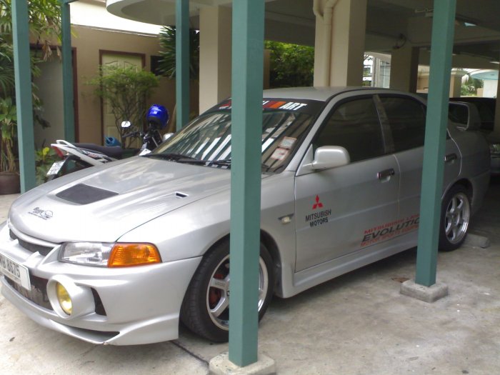 คันที่สามกับMITSUBISHI EVOLUTION IV 2.0 ปี1999 คันนี้แรงสุดๆขับจนเกียร์พัง ซ่อมเสร็จเลยขายให้เพื่อนรับไปดูแลต่อ