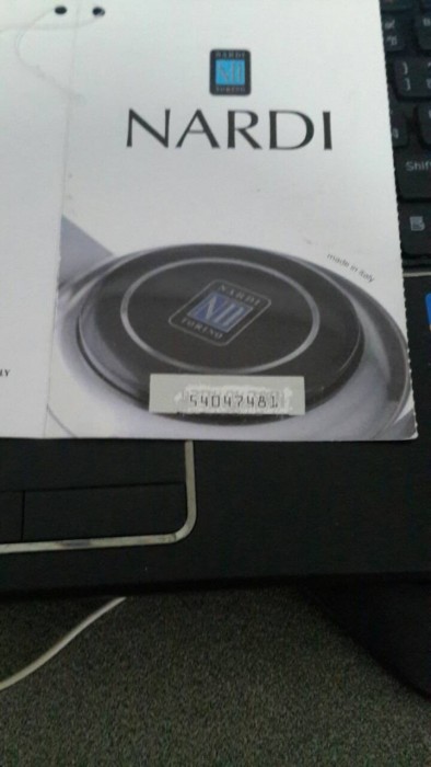ใบคู่มือที่มีแถบ ขูดออกจะมีตัวเลข
